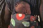 Mother and baby, Mauritania. Photo: Jorgen Schytte/Still Pictures